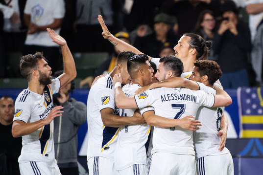Zlatan Ibrahimovic of LA Galaxy celebrates with teammates