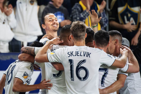 Zlatan Ibrahimovic of LA Galaxy celebrates with teammates