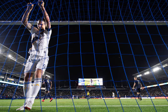 Zlatan Ibrahimovic of LA Galaxy rips the net of a goal
