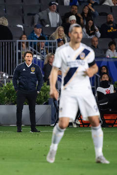 Head coach Guillermo Barros Schelotto behind Zlatan