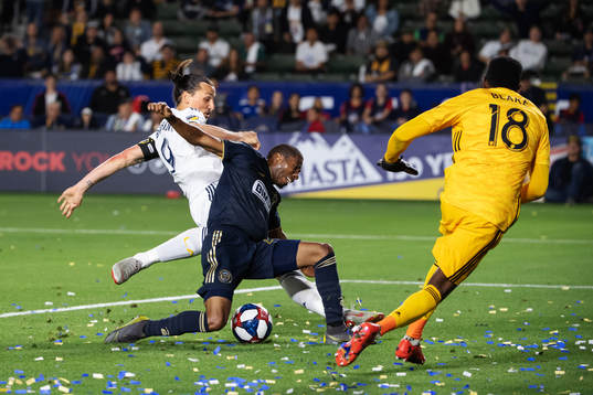 Zlatan Ibrahimovic of LA Galaxy and Raymon Gaddis of