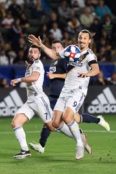 Romain Alessandrini and Zlatan Ibrahimovic of LA Galaxy