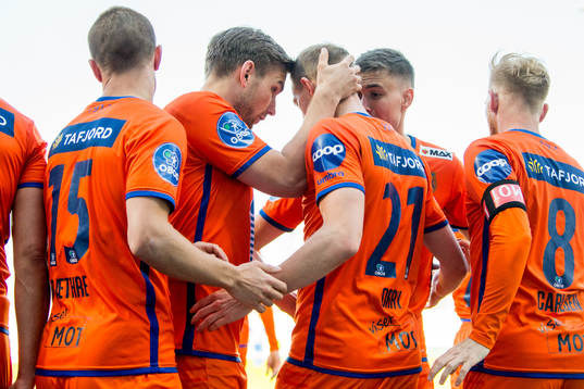 Peter Orry Larsen of Aalesund celebrates with teammate