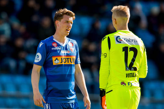 Marius Høibråten and goalkeeper Walter Viitala of