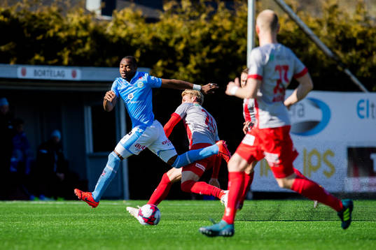 Kachi of Sandnes Ulf and Mats-Andre Kaland of Strømmen