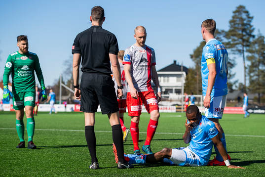 Kachi of Sandnes Ulf lies down with an injury