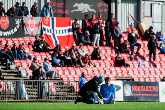Axel Kryger of Sandnes Ulf lies down with an injury