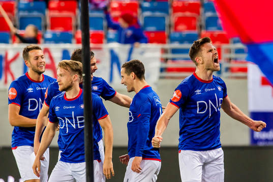 Herolind Shala of Vålerenga celebrates with his teammates