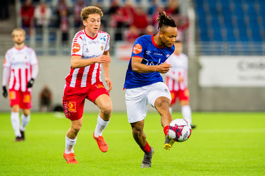 Tomas Stabell of Tromsø and Chidera Ejuke of Vålerenga