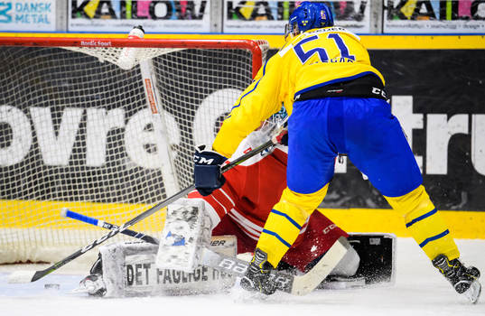Emil Sylvegård of Sweden scores the 0-2 goal behind Simon