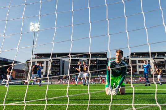 Goalkeeper Jakob Karlstrøm of Tromsø looks dejected
