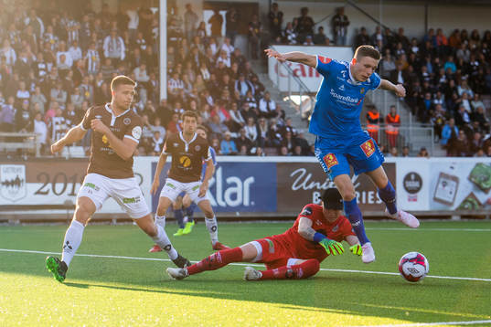 Sondre Johansen, goalkeeper Julian Faye Lund of Mjøndalen