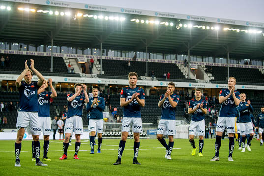 Sondre Flem Bjørshol and the players of Viking look