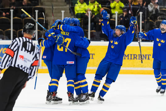 Swedens Alexander Holtz celebrates