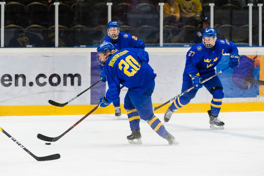 Swedens Karl Henriksson Alexander Holtz and Lucas Raymond