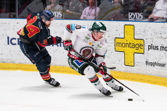 Djurgårdens Mattias Guter och Frölundas Joel Mustonen