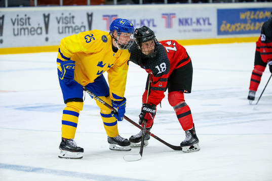 Simon Holmström of Sweden and Connor Zary of Canada