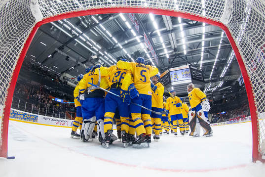 Players of Sweden celebrate