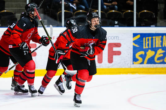 Connor Zary of Canada celebrates