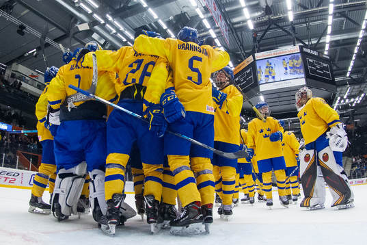 Players of Sweden celebrate