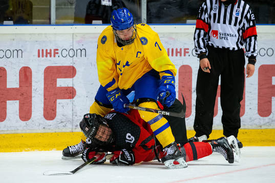 Tobias Björnfot of Sweden and Connor Zary of Canada of