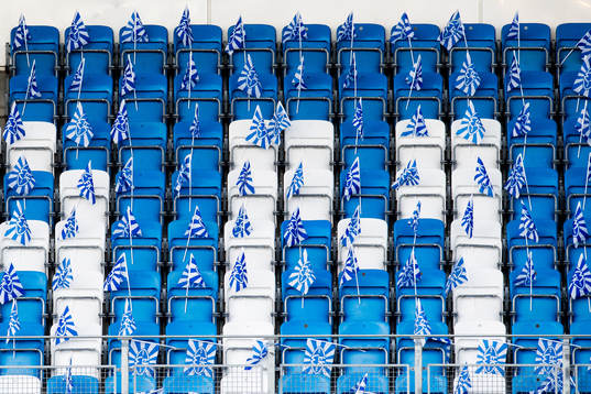 Flags and empty seats
