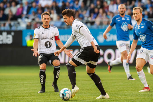 Mike Jensen and Pål André Helland of Rosenborg