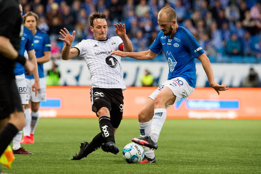 Mike Jensen of Rosenborg and Eirik Hestad of Molde