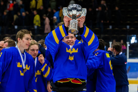 Players of Sweden celebrates with the trophy