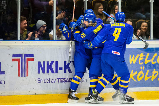 Lucas Raymond of Sweden celebrates with teammates