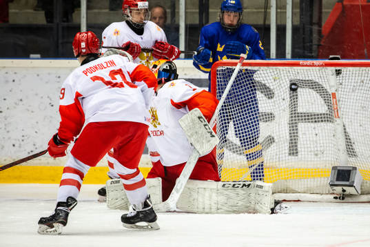 Lucas Raymond of Sweden (not in picrture) scores 4-3 behind