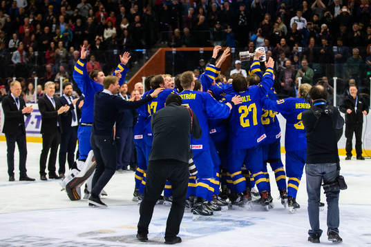 Players of Sweden celebrates with the trophy