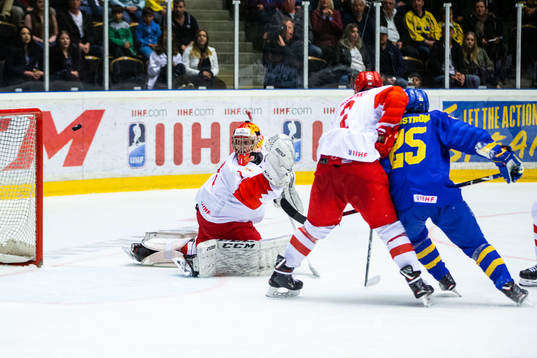 Simon Holmström of Sweden against goalkeeper Yaroslav