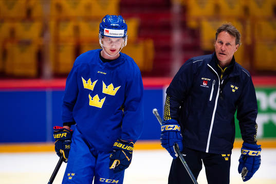 Elias Pettersson and Assistant coach Johan Garpenlöv