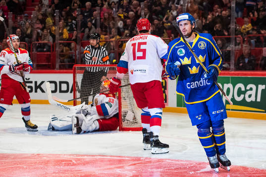 Marcus Krüger of Sweden celebrates scoring 3-1