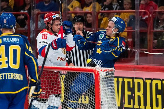 Sergei Plotnikov of Russia and Joakim Nygård of Sweden in