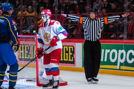 A referee denies Sweden a goal due to high stick
