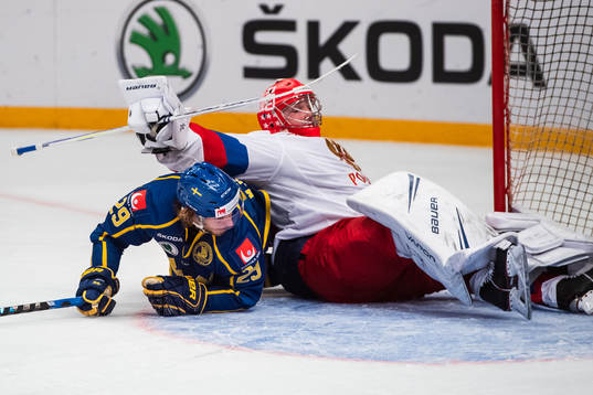 Mario Kempe of Sweden and goalkeeper Andrei Vasilevsky of