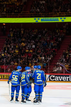 Mario Kempe of Sweden celebrates with team mates