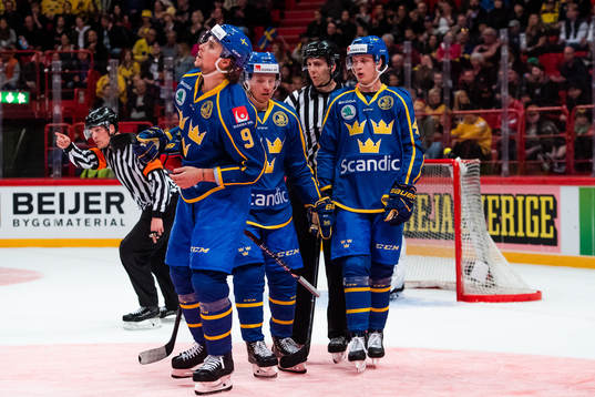 Adrian Kempe , Jesper Bratt and Elias Pettersson of Sweden