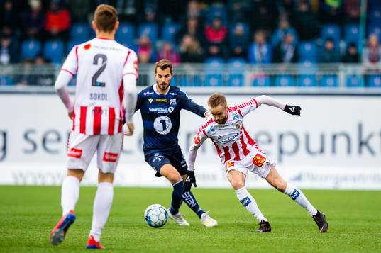 Joakim Skomsøy Bjerkås of Kristiansund and Daniel Mikal