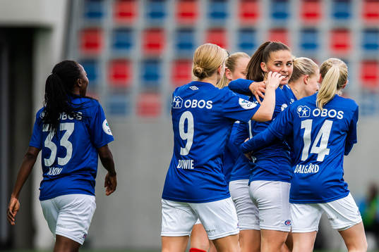 Jenna Dear celebrates with Ajara Njoya, Natasha Dowie and