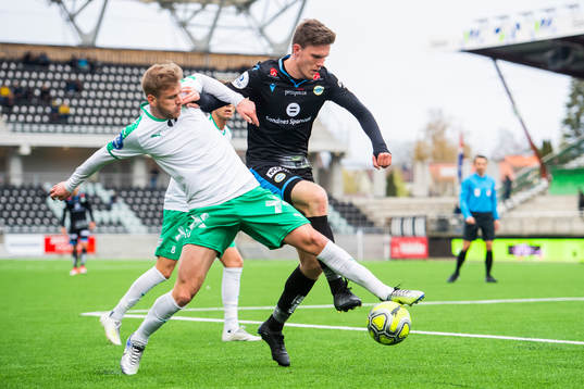 Emil Sildnes of HamKam and Ingvald Halgunset of Sandnes Ulf