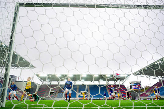 Synne Hansen of LSK Kvinner scores 0-1 behind goalkeeper