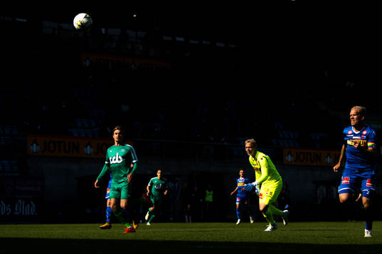 Marcus Mehnert of Nest-Sotra scores 1-1 behind goalkeeper