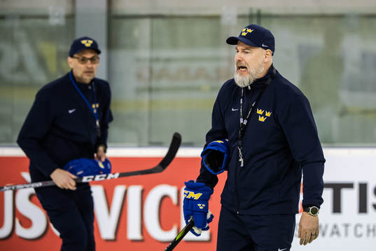 Assistant coach Peter Popovic and head coach Rikard