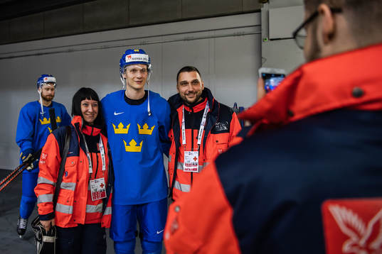 Elias Pettersson of Sweden takes selfies with supporters
