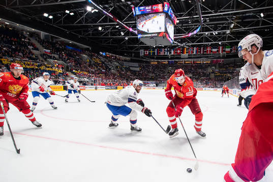 Jonas Holøs of Norway and Evgeni Malkin of Russia