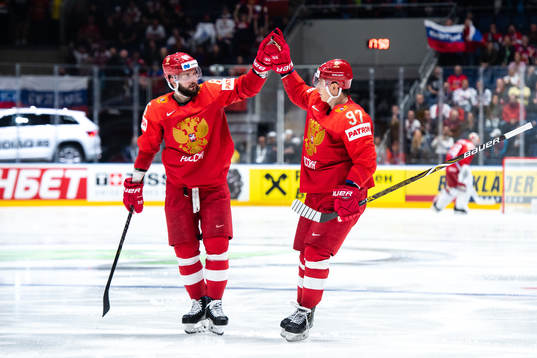 Nikita Kucherov and Nikita Gusev of Russia celebrate the