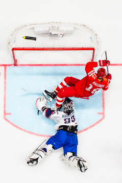 Goaltender Henrik Haukeland of Norway against Artyom